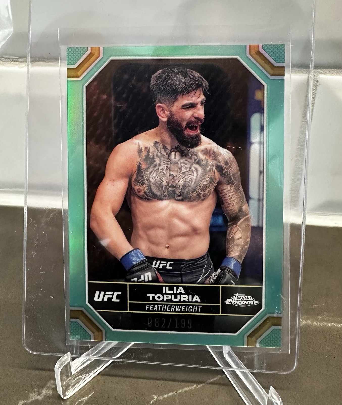 2024 Topps Chrome UFC Ilia Topuria #77 Aqua Refractor /199