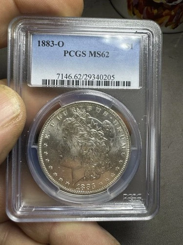1883-O Morgan Dollar. Pcgs Ms62 With Rainbow Crescent Toning. Beautiful Coin.