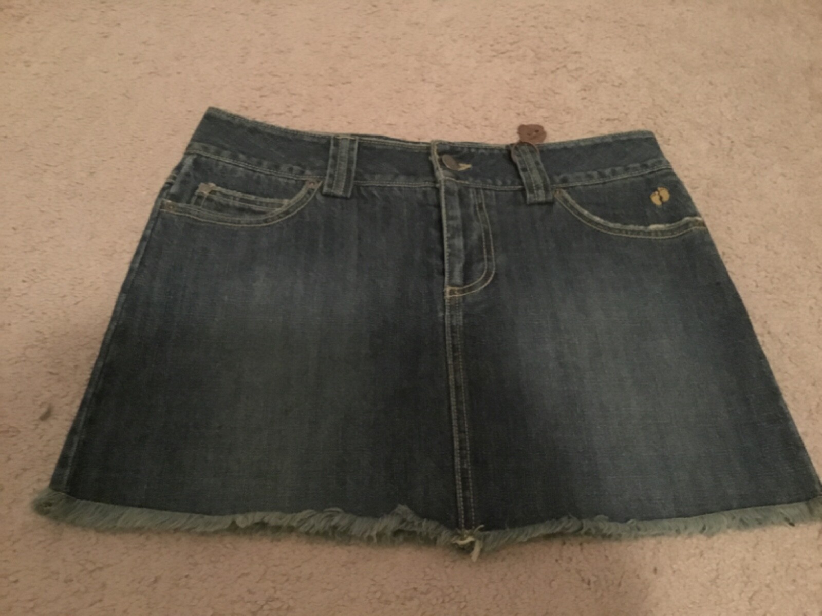 Vintage NWOT denim mini skirt size 5 retro style-image