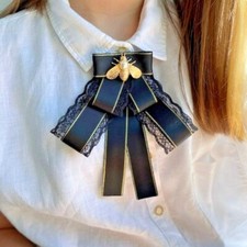 Elegantly Crafted Ribbon Brooch with Dainty Bee Detail and Striped Ribbon