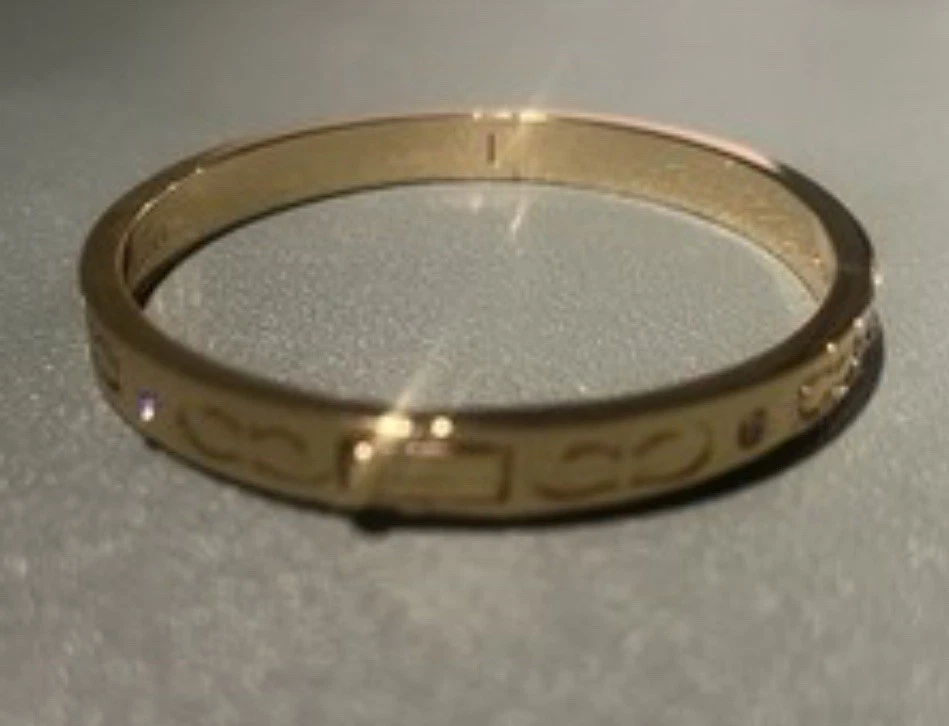Set gioielli Coach oro collane a catena a strati e braccialetto firmato C
