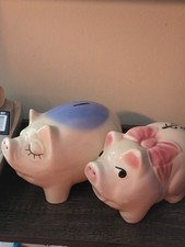 Boy and girl piggy bank