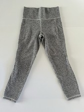 Athleta Salutation Stash II Textured Tight Women’s M Black Micro Cheetah Print