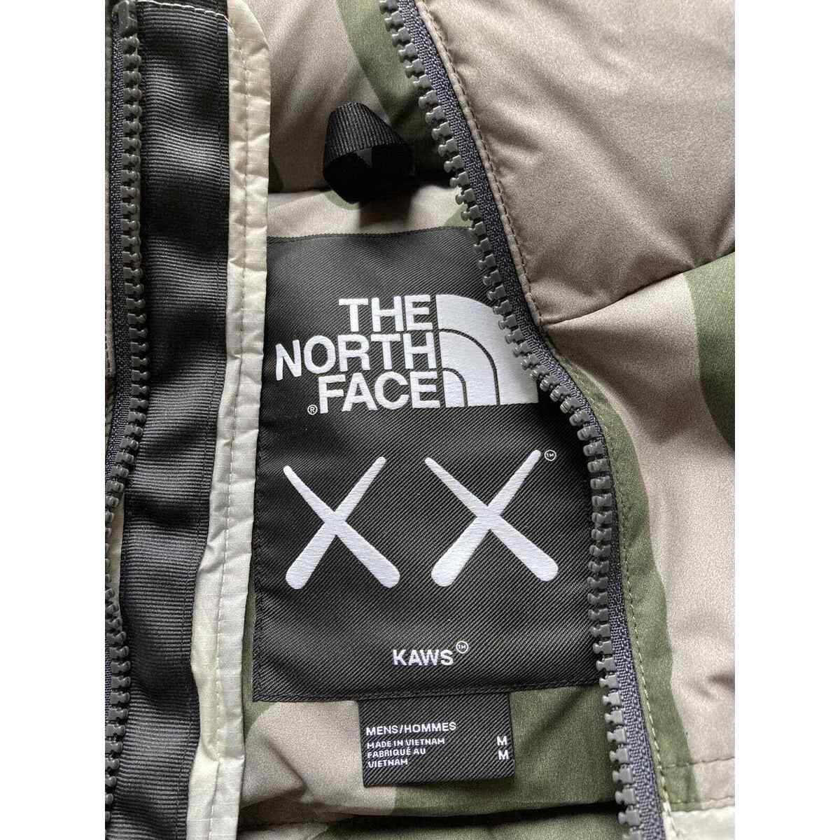 KAWS x TNF 1996 Nuptse The North Face Jacket Moonlight Ivory KAWS x TNF 1996 Nuptse The North Face Jacket Moonlight Ivory