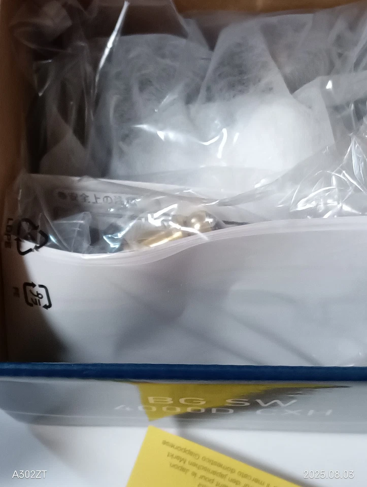 Carrete giratorio Daiwa 23 BG SW 4000D-CXH metal negro en caja nuevo Foto 3 de 4