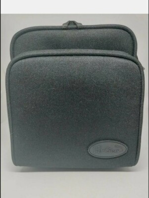 Black Hi-Gear Camera bag with strap. New can fit a DSLR with regular Lens.