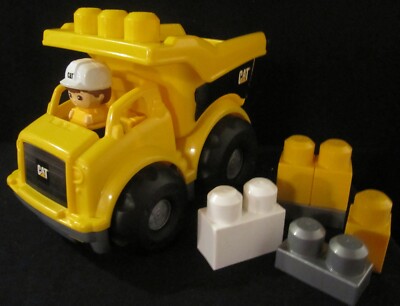 Mega Bloks Yellow Caterpillar Dump Truck with Blocks and Driver 