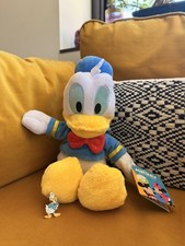 Peluche Disney Donald Duck Core 25cm NUOVO con etichetta Spilla Paperino regalo 