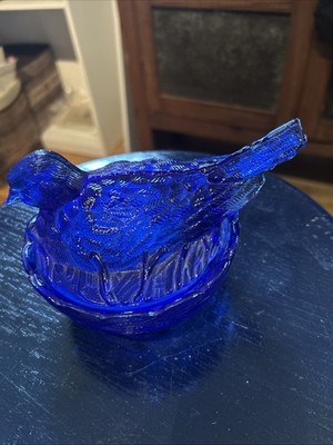 Colbolt blue glass chicken in a nest bowl small chip on beak