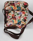LeSportsac Mele crossbody bag featuring a vibrant Hawaiian-themed tropical Print