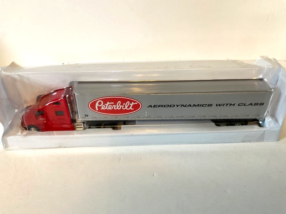 Peterbilt 387 Model Peterbilt Logo Tractor Trailer 1/64th Scale Speccast  #33516 - Image 2 of 4