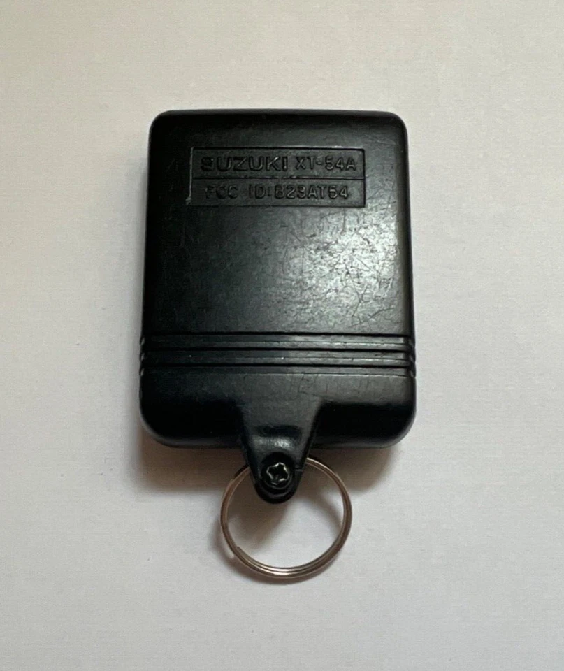 Transmisor remoto OEM SUZUKU X90 SIDEKICK ESTIMA GRAND VITARA B23AT54 XT-54A Foto 4 de 4
