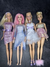 Barbie Lot Restyled - one doll is Barbie Pega...