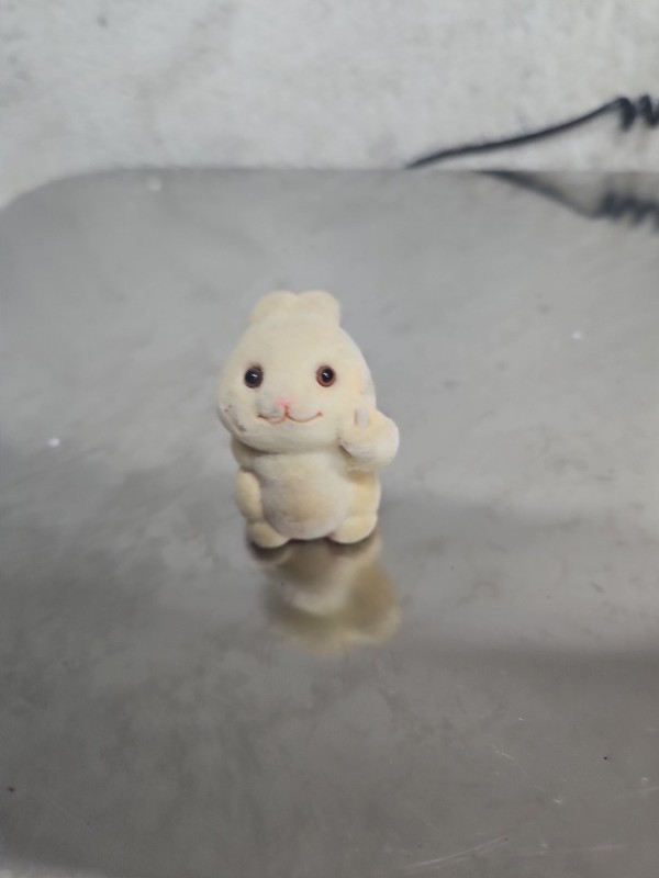 vintage flocked bunny figurine, likely a Hallmark