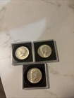 three 1964 half dollar coins silver