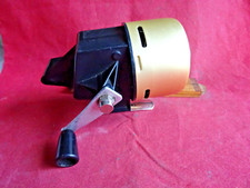 A VERY GOOD VINTAGE ABU ABUMATIC 220 CLOSED FACE SPINNING REEL (GOLD COVER)