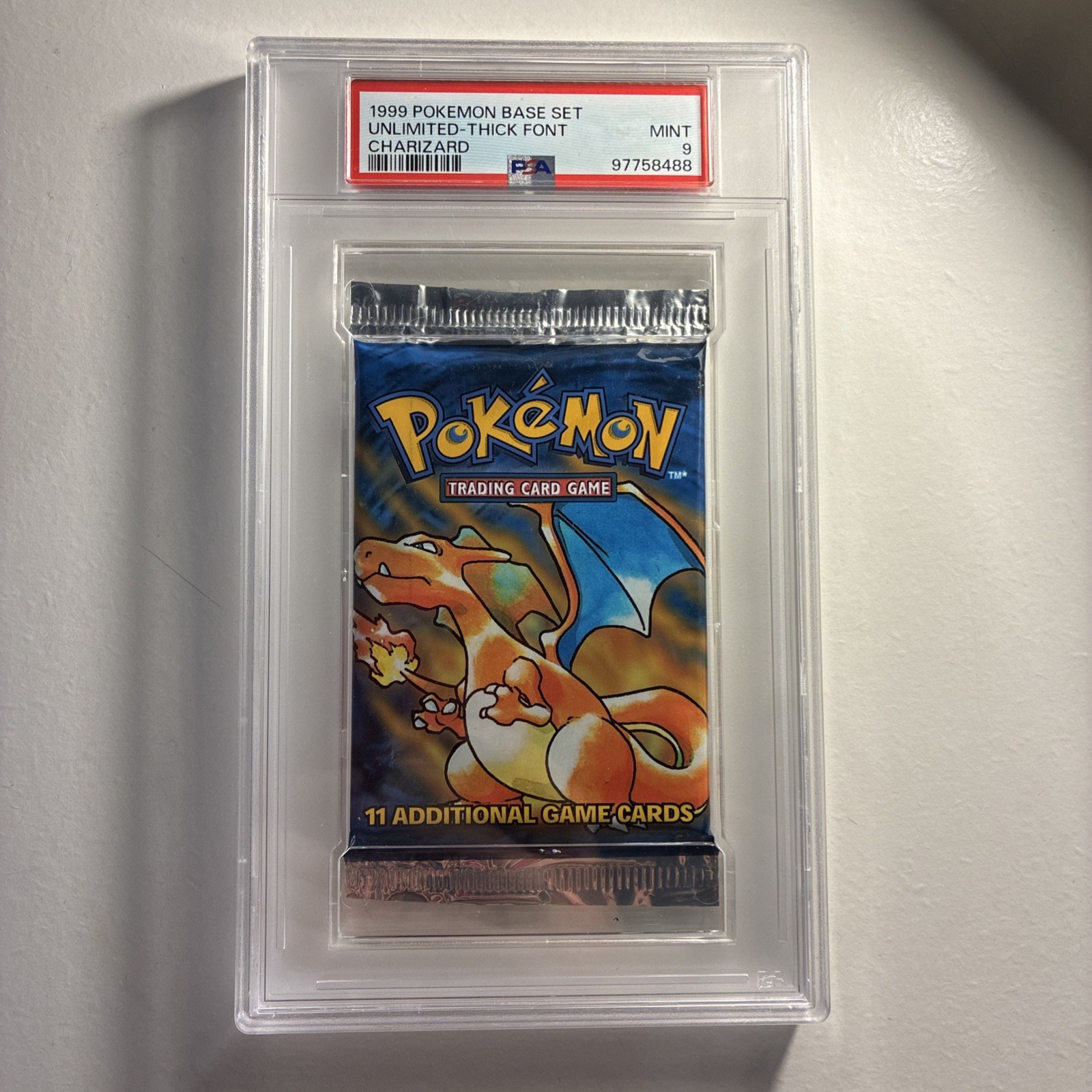 1999 POKEMON BASE SET UNLIMITED GRADED FOIL PACK THICK FONT CHARIZARD PSA 9