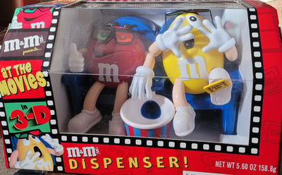 VINTAGE M&M'S RED & YELLOW AT THE MOVIES CANDY DISPENSER for sale