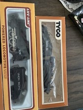 11 TRAIN PIECES. ENGINES TO RAILS