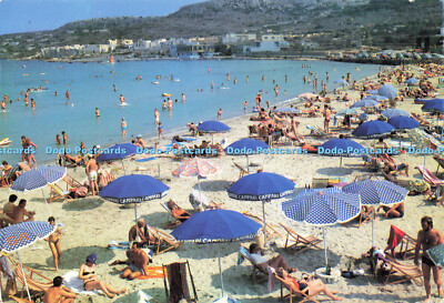 D144353 Sandstrand bei Mellieha Bay. Malta. Promotion Services. A whats on card