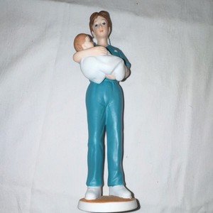 Lefton China Nurse Figurine in Blue Scrubs Holding Baby 1996 SRN 10844