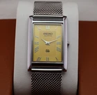 Vintage Seiko Slim Quartz Men's Wrist Watch Yellow Dial with Silver Mesh Band