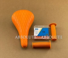 ORANGE DIAMOND STITCHED BMX BIKE SADDLE W/BMX KMC CHAIN & MUSHROOM STYLE GRIPS.