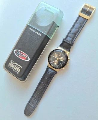 Swatch: James Bond 007 "Goldfinger" (YCG401) Ironie Chrono *Top Occasion!* - Photo 1/4