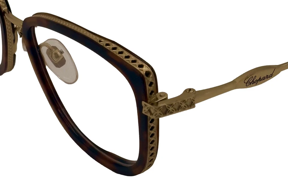 Marco de gafas para mujer Chopard cuadrado dorado tortuga titanio VCH256M 08FE53 mm Foto 3 de 4