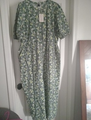 Universal Thread Floral Short Sleeve Jumpsuit with Button Front.