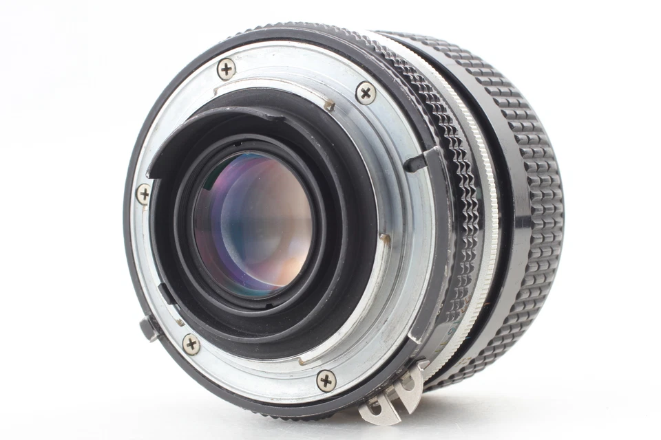 🎦VIDEO👀 CON CAPUCHA HN-1 ✨COMO NUEVA✨ Nikon Nikkor-N Auto 24 mm f/2,8 no Ai de JAPÓN Foto 3 de 4