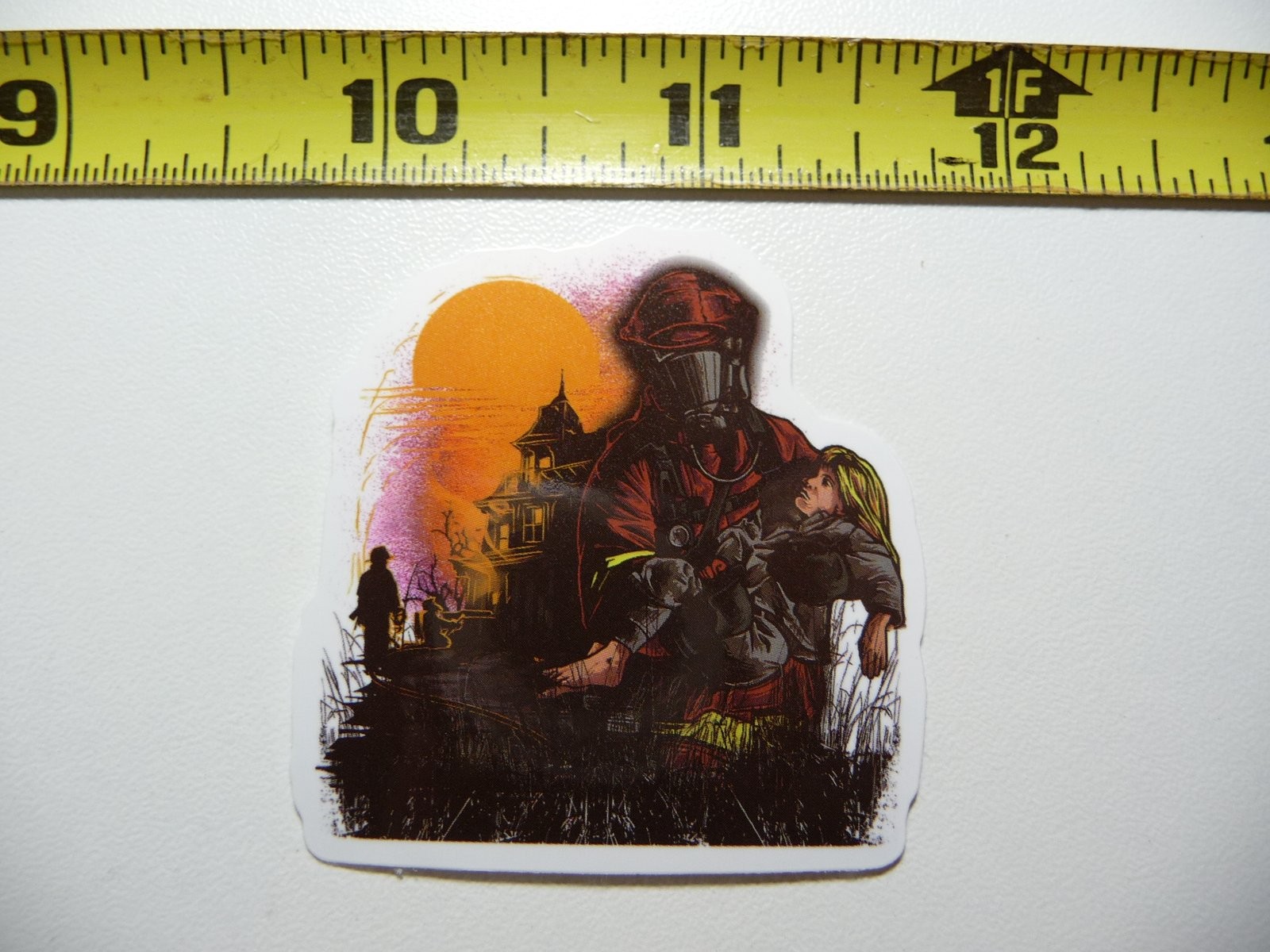 Brave Firefighter Rescuing Child Heroic Decal Sticker