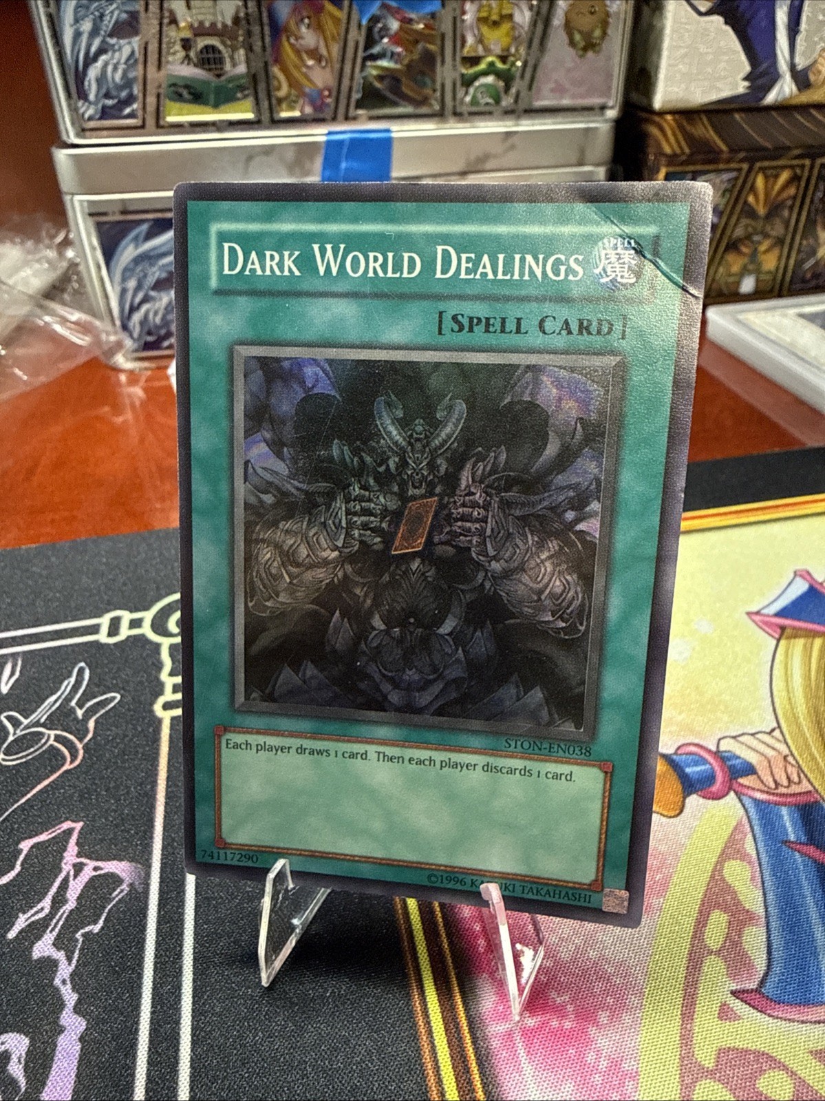 Dark World Dealings STON-EN038 YuGiOh Strike of Neos trading card — raw and PSA graded price guide