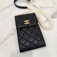 Chanel phone holder bag black gold 31st cross bag
