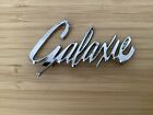 <!--F#f_0-->FORD 1961 GALAXIE GENUINE CURVED CHROME GLOVEBOX BADGE. P/N.C1AB-6204460-A<!--F/-->