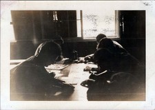WW2 Photo of Soldiers Working at Table in Barracks