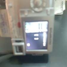Olympus CAMERA C-765 Ultra Zoom 4.0MP Digital Camera Silver + Card + strap.