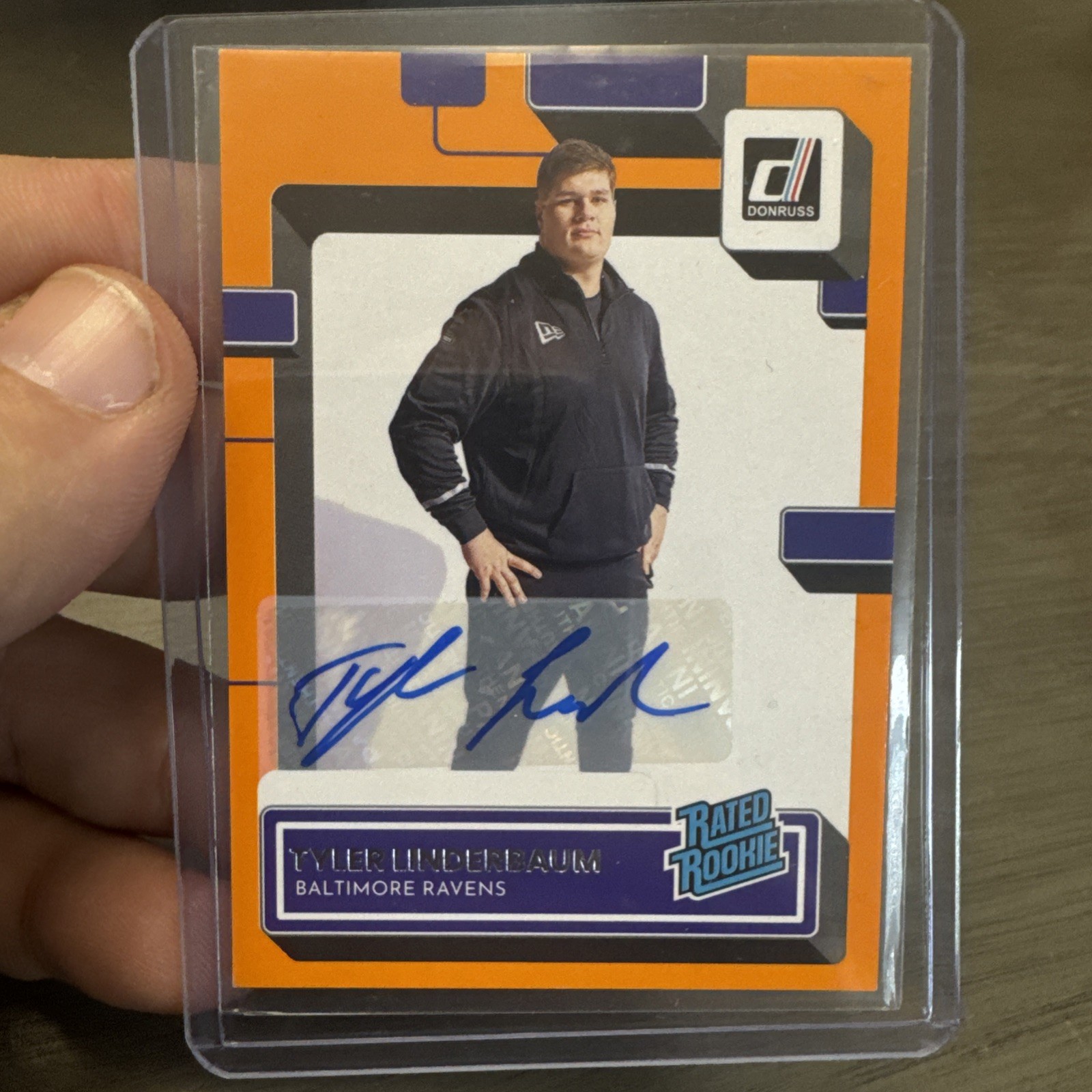 Tyler Linderbaum 2022 Donruss #400 Rated Rookie Autographs - Orange RAW