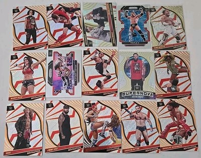 Lot of (15) 2022 Panini Revolution/Prizm Cards. Triple H/Owens/Bayley/Edge/Uso