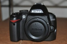 Nikon D3000 10.2MP Digital SLR Camera - Black (Body Only) w/ Battery + Charger