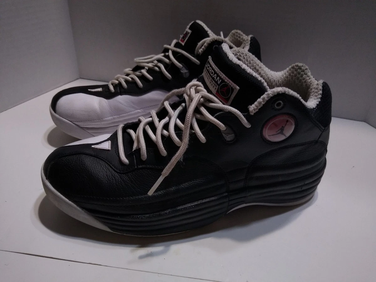 Jordan jumpman team hot sale 1 black and white