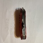 Red Stainless Steel Multi-Tool Knife Scissors Serrated Bottle Opener Lightweight — photo 3