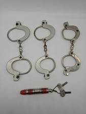 Three Vintage 50/60s Metal Toy Handcuffs for kids  Vtg metal flashlight  keys