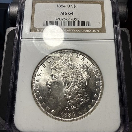 1884-O Morgan Silver Dollar – NGC MS64 – Attractive Blast White Luster