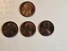 Four Uncirculated 1909 Lincoln Cents including one 1909 VDB Penny.