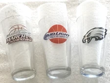 3-NEW BUD LIGHT BEER PINT GLASSES NFL PHILA EAGLES & 2-MARCH MADNESS BASKETBALL