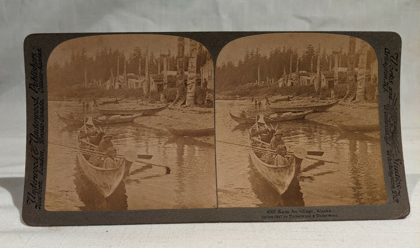1907 KASA AN VILLAGE, ALASKA STEREOVIEW, TOTEM POLES, INDIANS IN CANOES ...