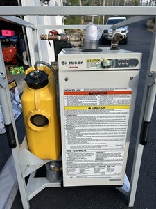 Toyotomi temp boiler, water heater. Never used with manual. Portable on wheels.