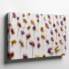 Delicate Arrangement Of Assorted Dried Flowers Scattered Across A Soft Wall Art