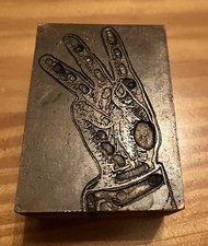 Antique letterpress printing block ,a raised hand oath / pledge symbol integrity